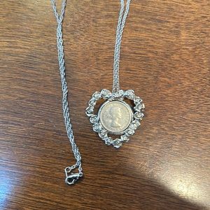 Stainless steel necklace with coin in center 1961 6 pence coin